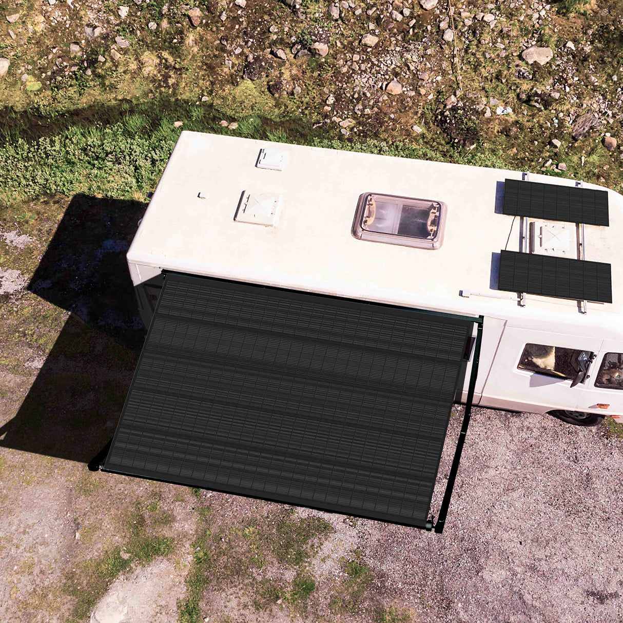 Overhead view of RV using AWNLUX solar powered awning to create shaded outdoor area, ideal for off-grid camping