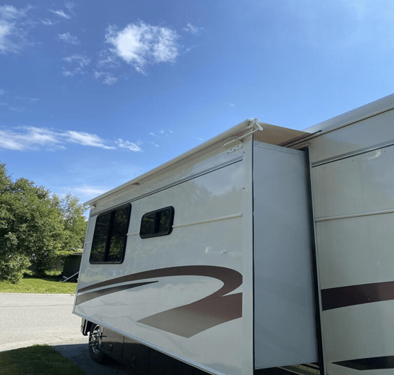 Why Should I Use an RV Slide Topper Awning? - AWNLUX